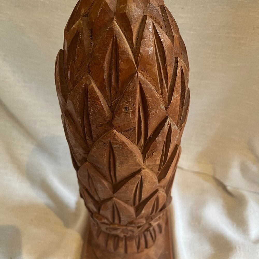 handcarved artichoke finial